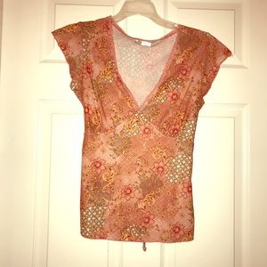 Very light and feminine top.